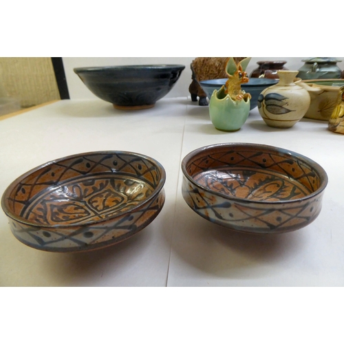 157 - Studio pottery: to include bowls; mugs; and animals  mixed sizes