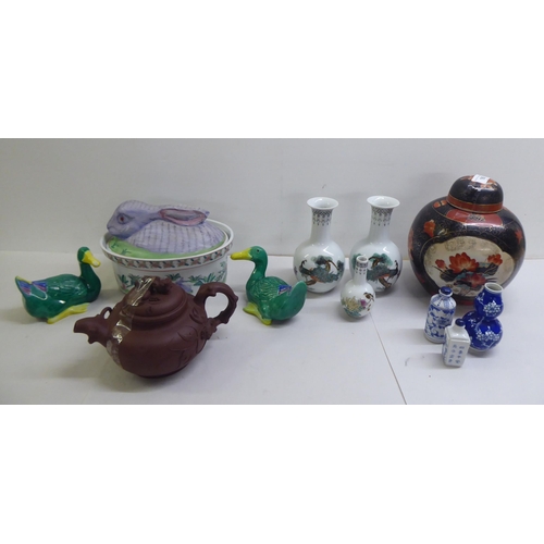 160 - Post World War II Oriental collectables: to include model ducks; and a selection of vases, decorated... 