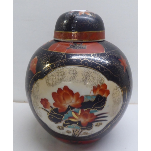 160 - Post World War II Oriental collectables: to include model ducks; and a selection of vases, decorated... 