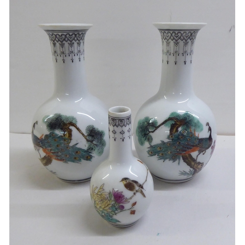 160 - Post World War II Oriental collectables: to include model ducks; and a selection of vases, decorated... 