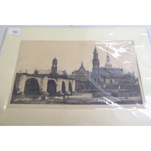 162 - Three early 20thC etchings: to include a view of Dresden  monochrome print  bears a pencil... 