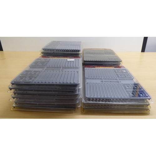 171 - Approx. twenty packs of Warhammer Movement Trays