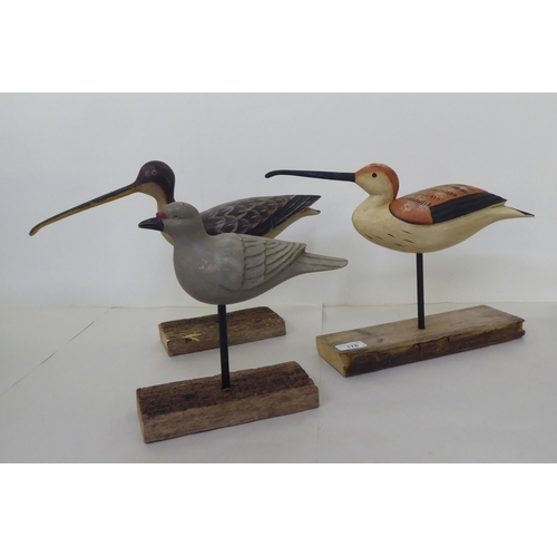 178 - Three carved and painted wooden birds, on stands  largest 11