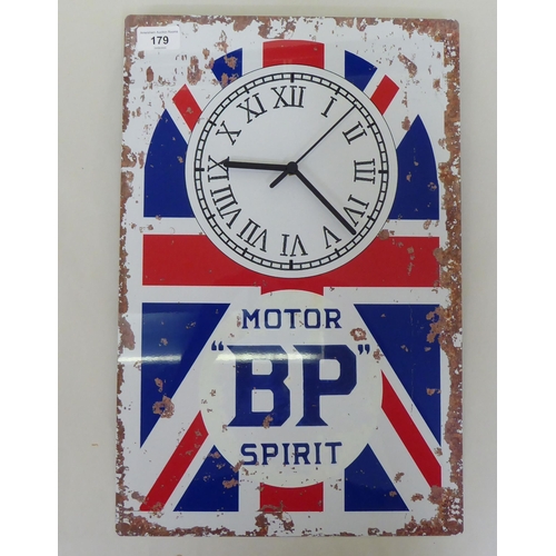 179 - A modern promotional quartz wall clock, set on a metal sheet, printed with BP colours  18