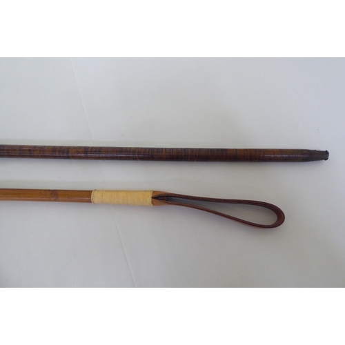 185 - An early 20thC leather walking cane  35