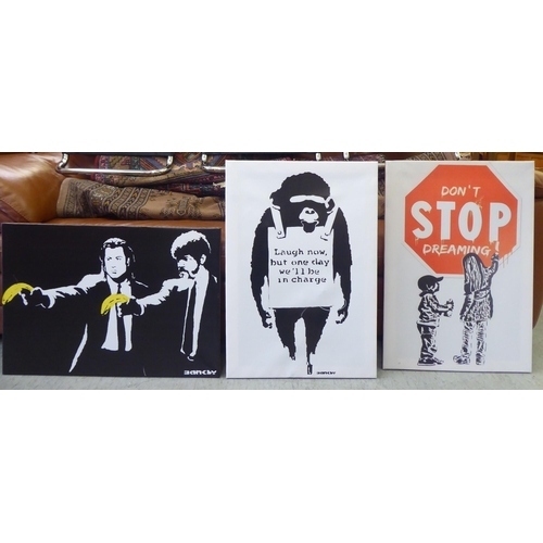 188 - Three reproduction prints, depicting various Banksy designs  each 26