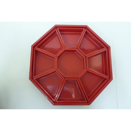 204 - A mixed lot: to include a Chinese lacquered hors d'oeuvre dish, of octagonal form with a tray fitted... 