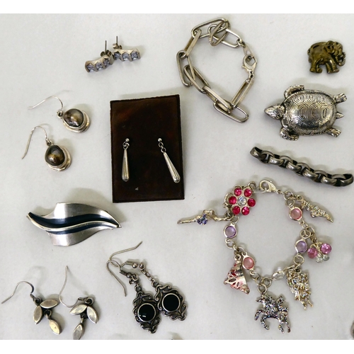 205 - Silver and white metal jewellery: to include a charm bracelet