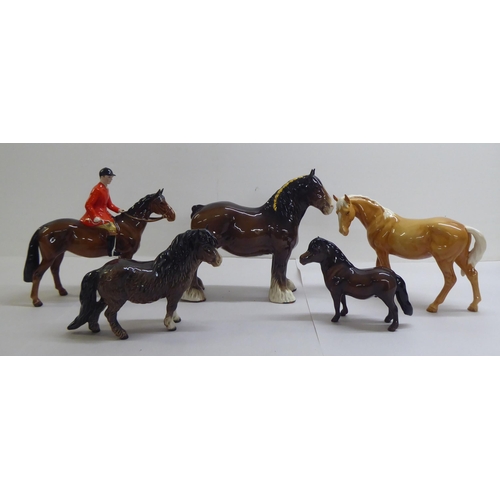 21 - Five Beswick pottery model horses and ponies: to include a 'Huntsman'  8.5