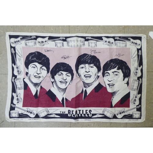 221 - A linen tea towel, depicting The Beatles  18