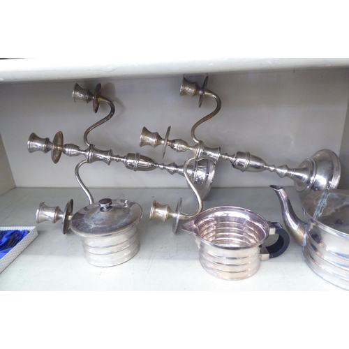 222 - Silver plated items: to include a pair of three branch candelabra  15.5