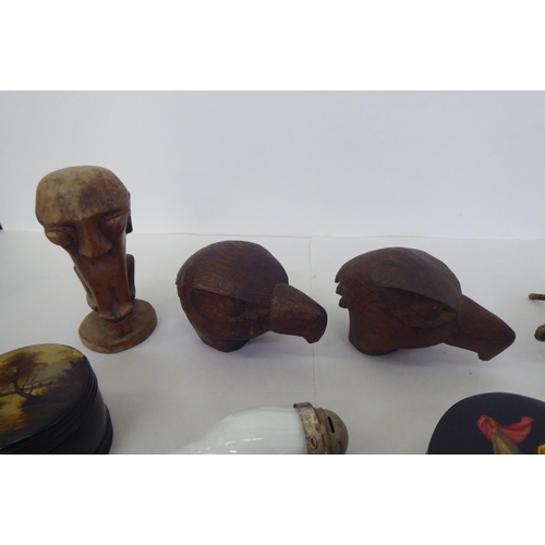 229 - A mixed lot: to include a pair of carved wooden models, birds heads  3