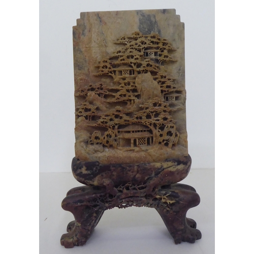 230 - Two pieces of Chinese soapstone ornament, viz. one depicting a mountainous village, on stand  1... 