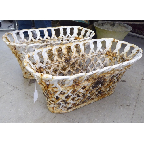 234 - A pair of white painted, cast iron baskets of lattice design  10