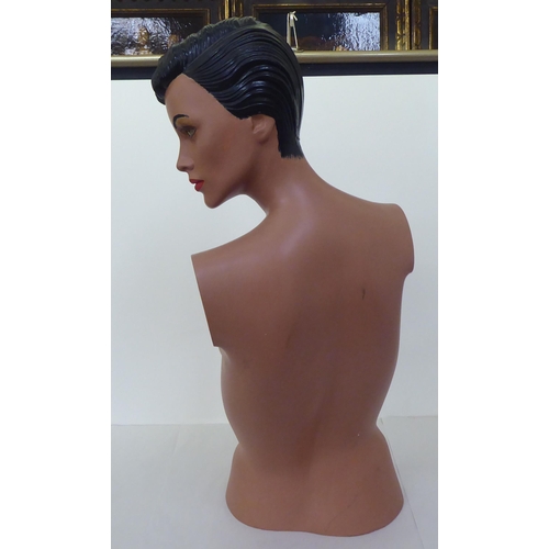 248 - A painted resin mannequin bust of a woman  30.5