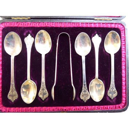 25 - A set of six presentation spoons; a silver pedestal caster; and a pair of silver plated presentation... 