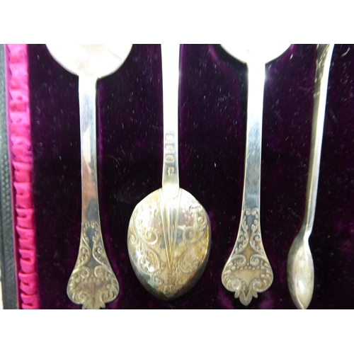 25 - A set of six presentation spoons; a silver pedestal caster; and a pair of silver plated presentation... 