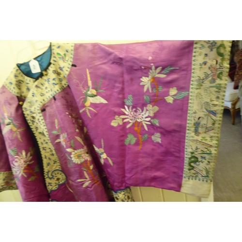 252 - A Chinese pink fabric jacket, embroidered with flowers