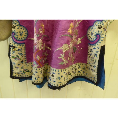 252 - A Chinese pink fabric jacket, embroidered with flowers