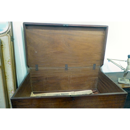 255 - An early 19thC oak mule chest, raised on bracket feet  34