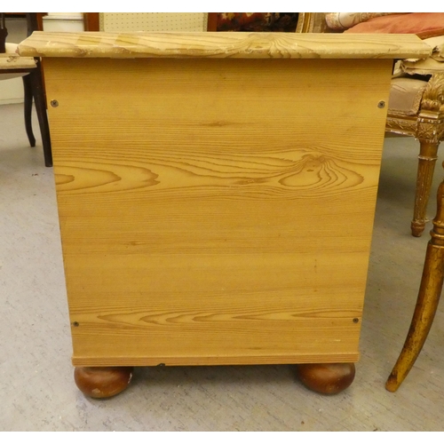 260 - A modern pine blanket chest, raised on bun feet  19.5