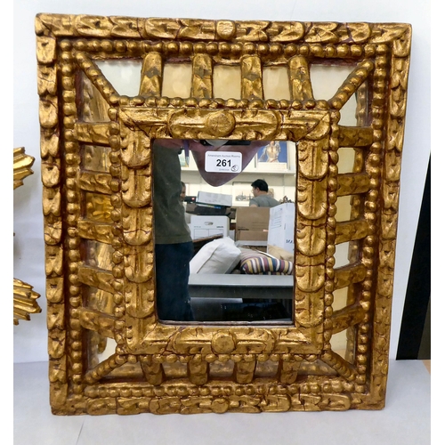 261 - A mixed lot: to include a modern mirror with multiple panels, in a gilt gesso frame  19