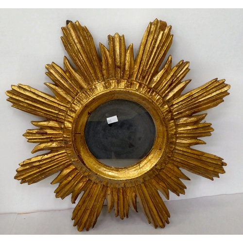 261 - A mixed lot: to include a modern mirror with multiple panels, in a gilt gesso frame  19