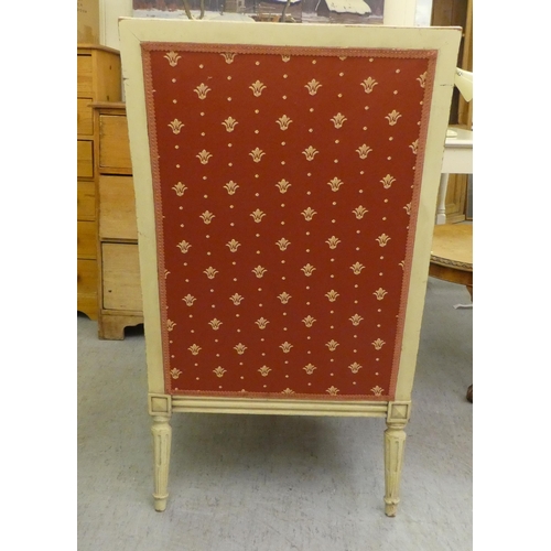 264 - A late 19thC Louis XVI design, cream painted salon chair with a red fabric upholstered back and seat... 