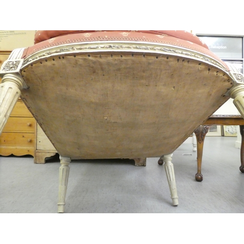 264 - A late 19thC Louis XVI design, cream painted salon chair with a red fabric upholstered back and seat... 