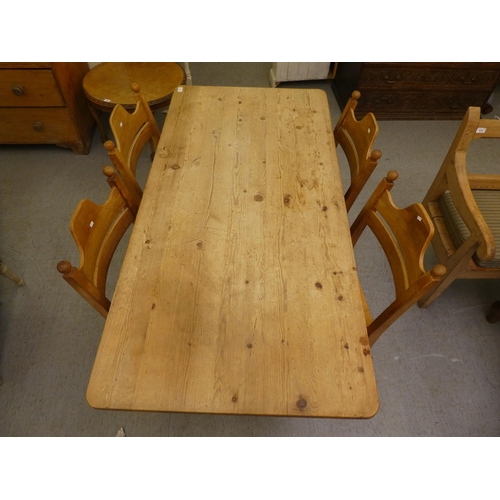 271 - A modern pine, farmhouse style dining table, raised on crossed legs, united by a stretcher  27.... 