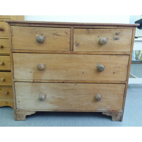 274 - An early 20thC pine chest of drawers, the planked top over two short/two long drawers, raised on bra... 