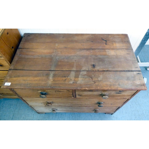 274 - An early 20thC pine chest of drawers, the planked top over two short/two long drawers, raised on bra... 