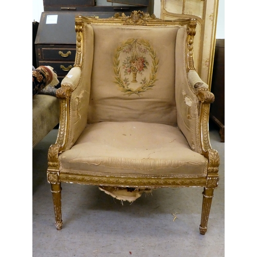 276 - A late 19thC Louis XVI design Continental, giltwood framed salon chair with a tapestry upholstered b... 