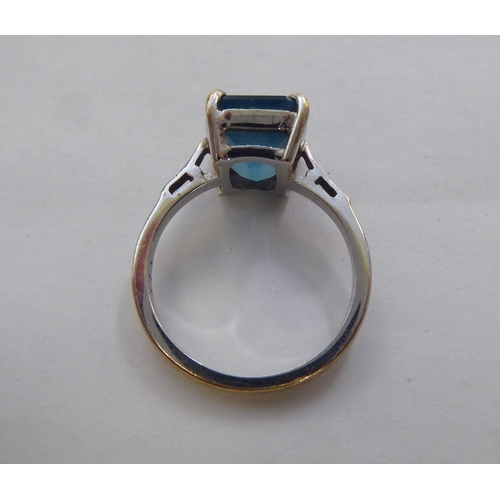 294 - A 9ct white gold ring, set with an octagon cut blue topaz