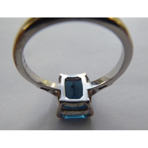 294 - A 9ct white gold ring, set with an octagon cut blue topaz