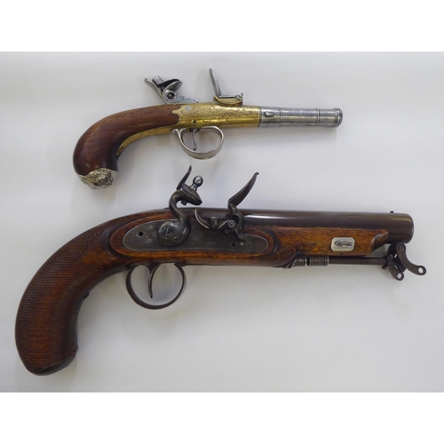 301 - Replica flint lock pistols, each with a walnut stock