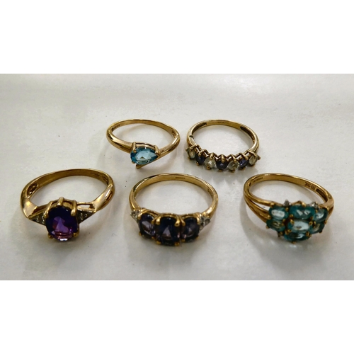 304 - Five 9ct gold dress rings: to include a crossover ring with a blue stone