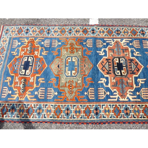 306 - A Khajli style runner, on a multi-coloured ground  34