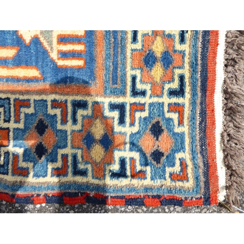 306 - A Khajli style runner, on a multi-coloured ground  34