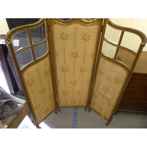 318 - A late 19thC Continental giltwood, three-fold roomscreen with fabric panels, raised on cabriole legs... 