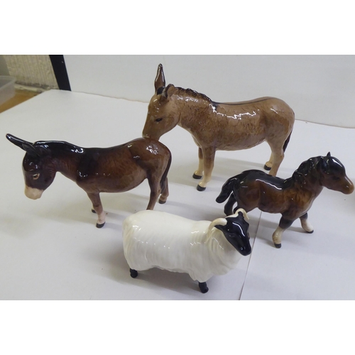 32 - Four Beswick pottery model animals: to include a donkey  6