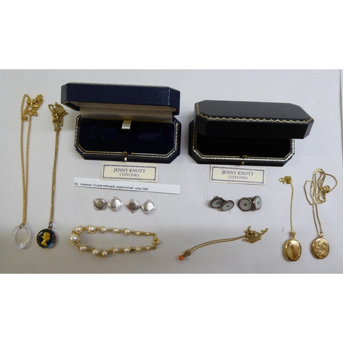 34 - White and yellow metal items of personal ornament: to include cufflinks; and an oval locket, on a fi... 