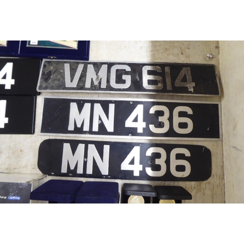 38 - Motor themed items: to include number plates, on an MG steering wheel  17