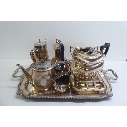 39 - Silver plate: to include a serving tray with a cast border and opposing handles  25