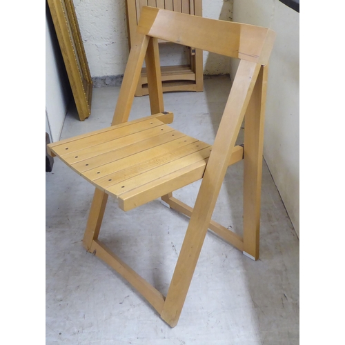 42 - A set of six modern beech framed folding chairs