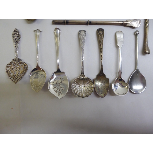 58 - Items of personal ornament and small collectables: to include a white metal tea strainer  stamped 80... 