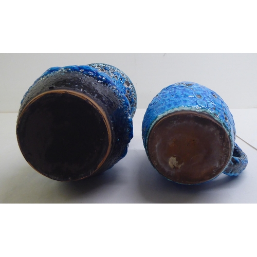 63 - Five items of blue/black Lava pottery: to include a vase  8