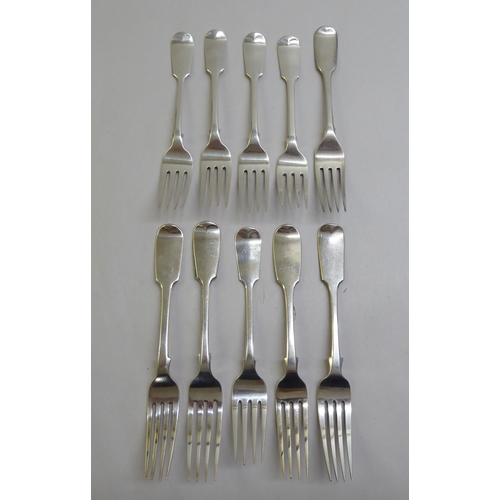 68 - A matched set of ten silver fiddle pattern table forks  mixed marks