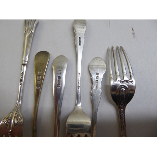 69 - Silver and white metal flatware  mixed marks