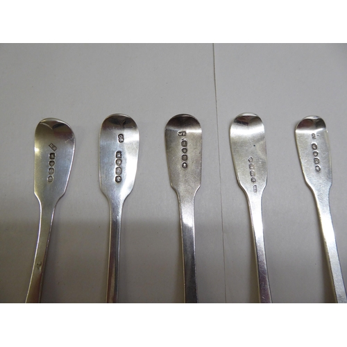 74 - A matched set of nine fiddle and other pattern table spoons  mixed marks